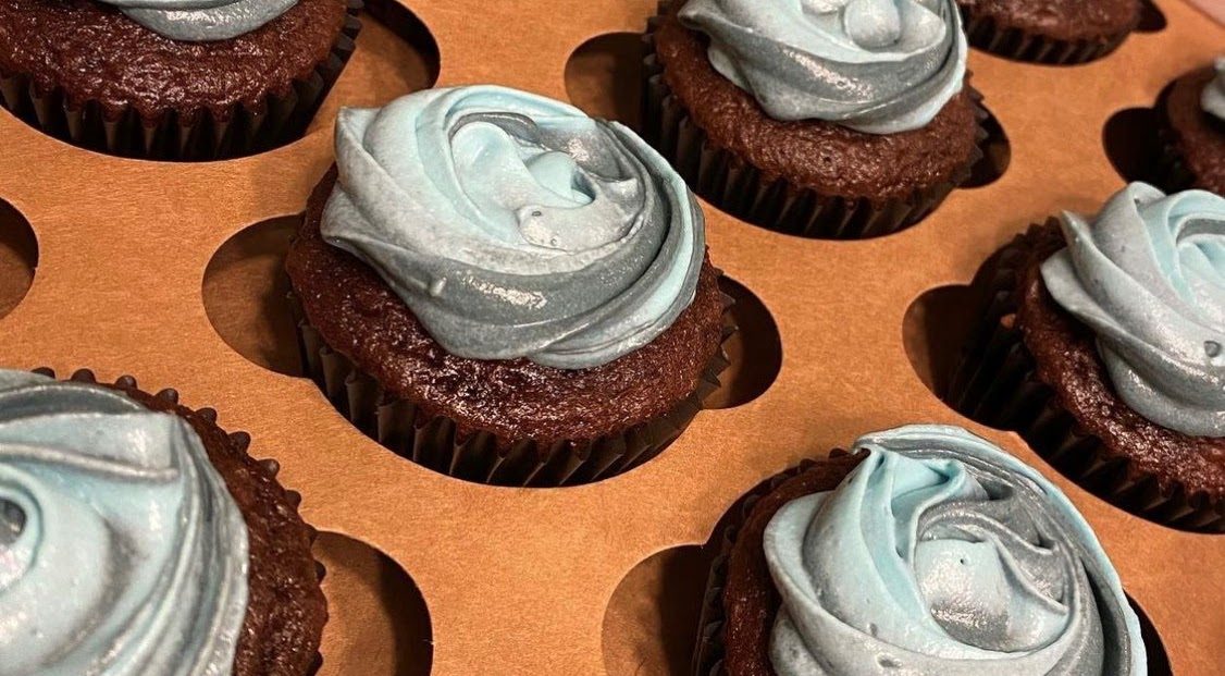 Chocolate cupcakes with black and blue swirls